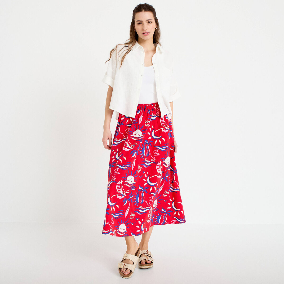 Jupon &eacute;vas&eacute; long rouge femme