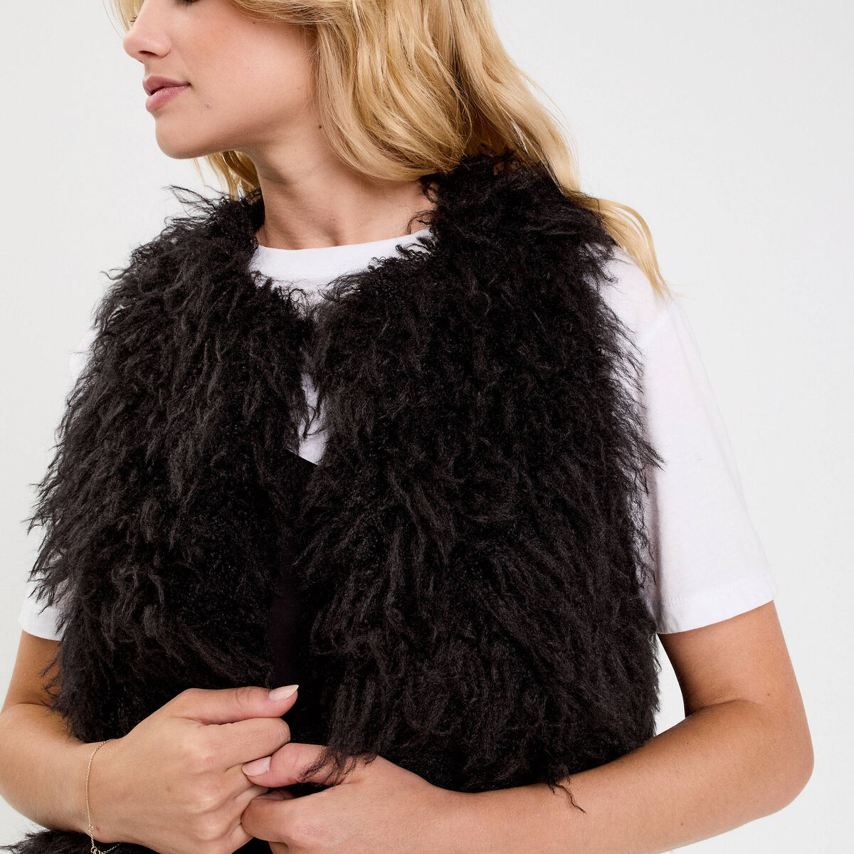 Gilet court sans manches fausse fourrure noir femme