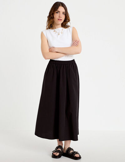 Jupon &eacute;vas&eacute; long noir femme