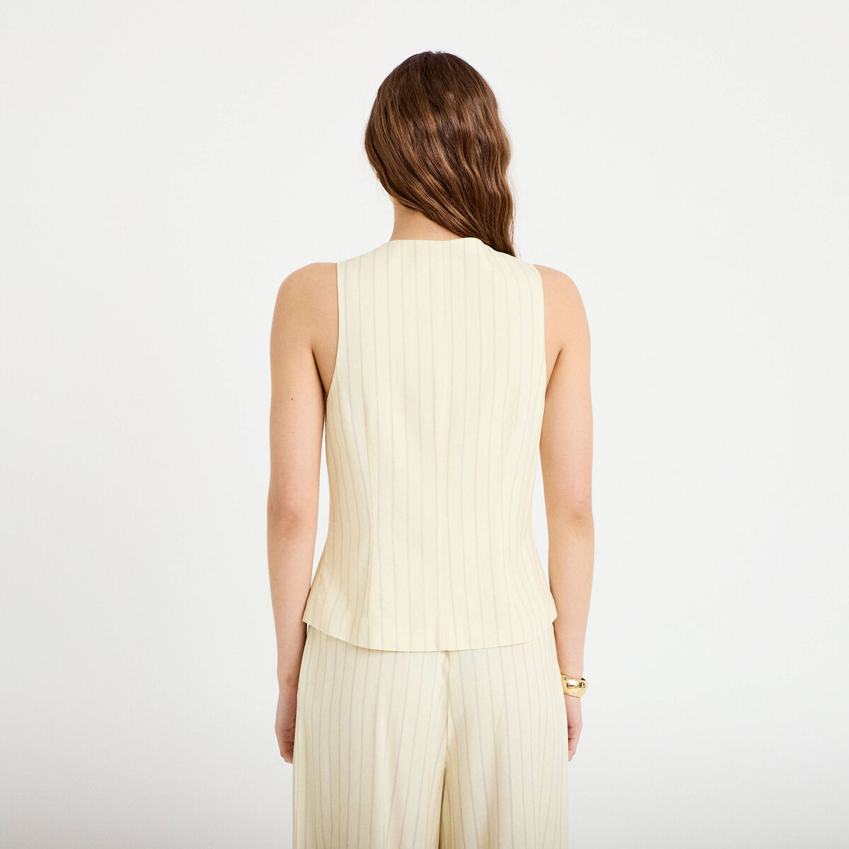 Gilet sans manches boutonn&eacute; jaune pastel femme