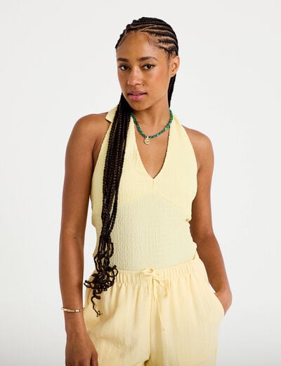 Top cintr&eacute; sans manches avec relief jaune pastel femme
