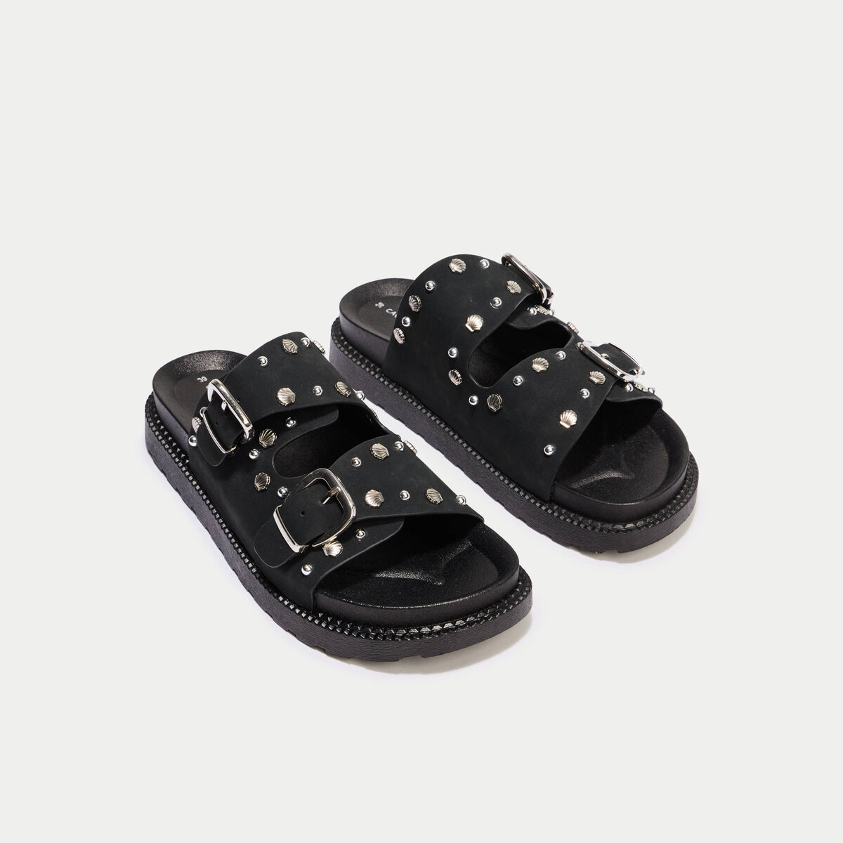 Mules &agrave; d&eacute;tails clout&eacute;s noir femme
