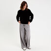 Pull fleurs en relief noir femme