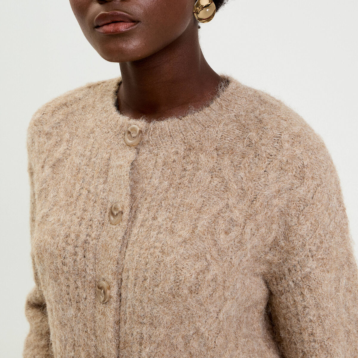 Gilet torsad&eacute; col rond beige femme