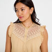 Blouse sans manches col rond beige femme