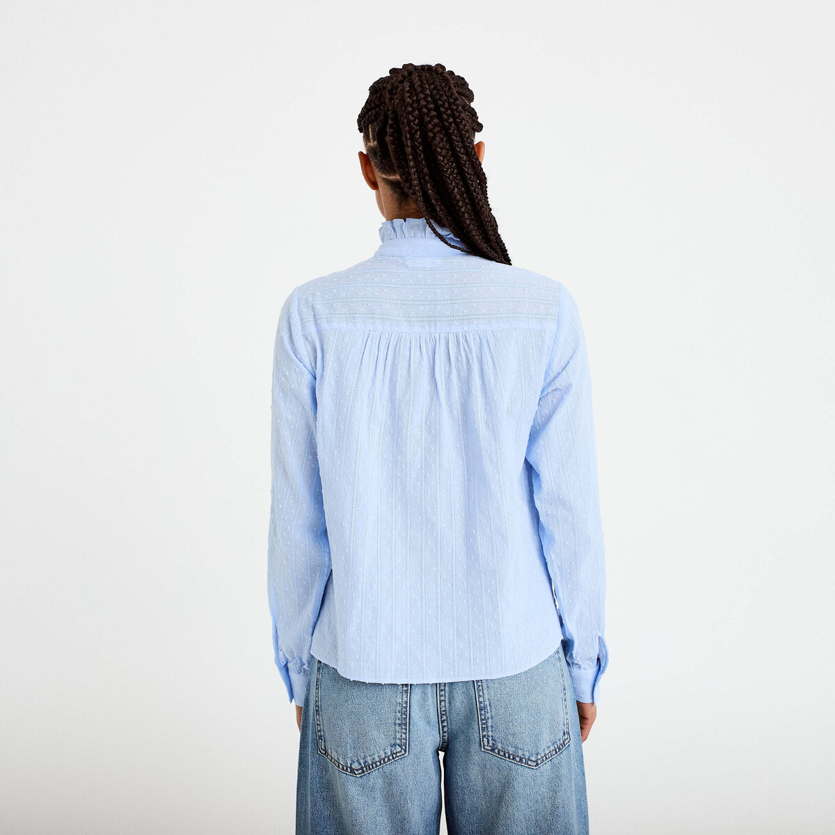 Chemise col montant manches longues bleu clair femme