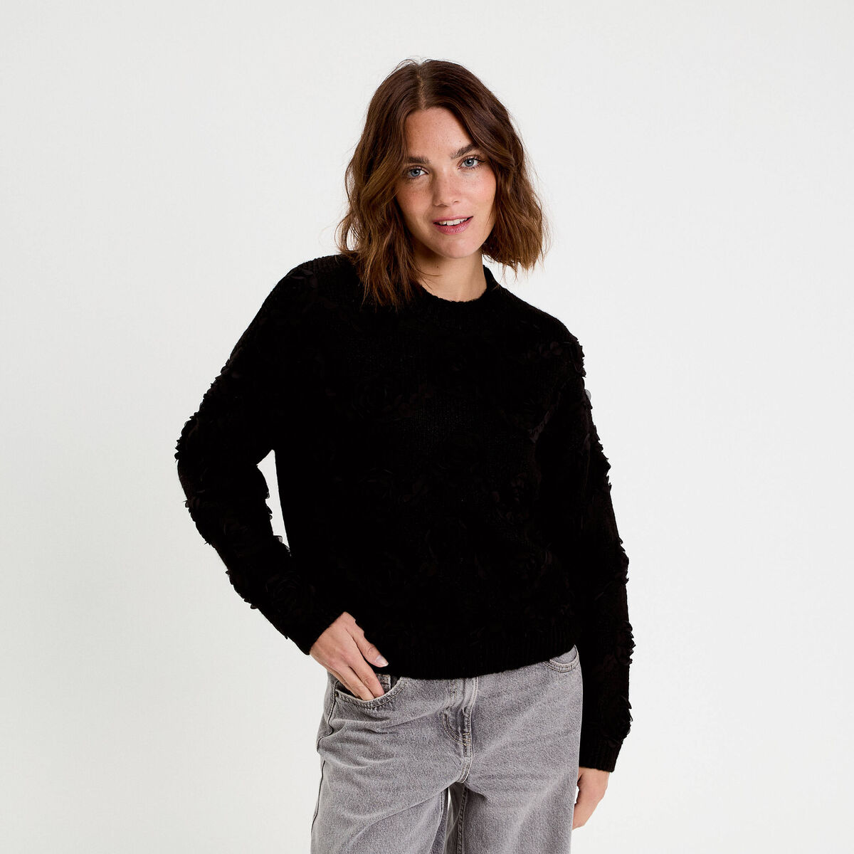 Pull fleurs en relief noir femme