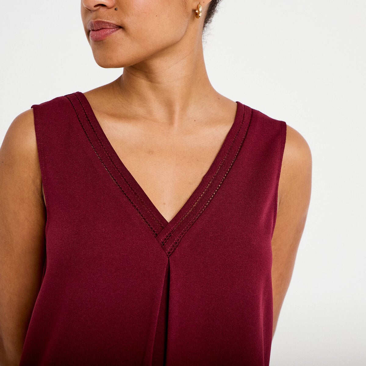 D&eacute;bardeur sans manches bordeaux femme
