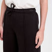 Pantalon large style jogging noir femme