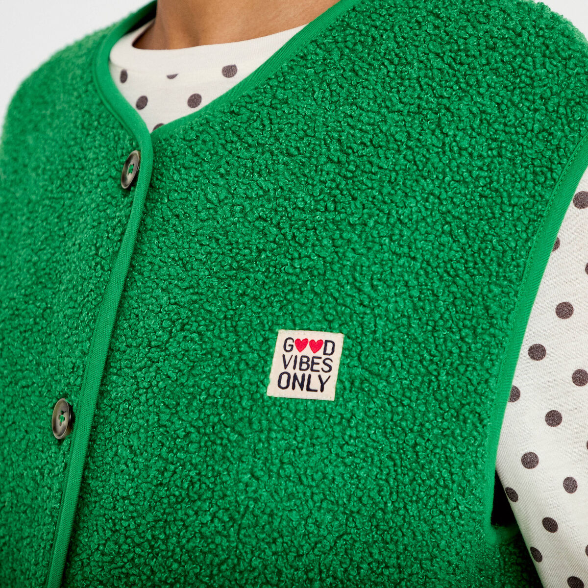 Veste sans manches fausse fourrure vert fonc&eacute; femme