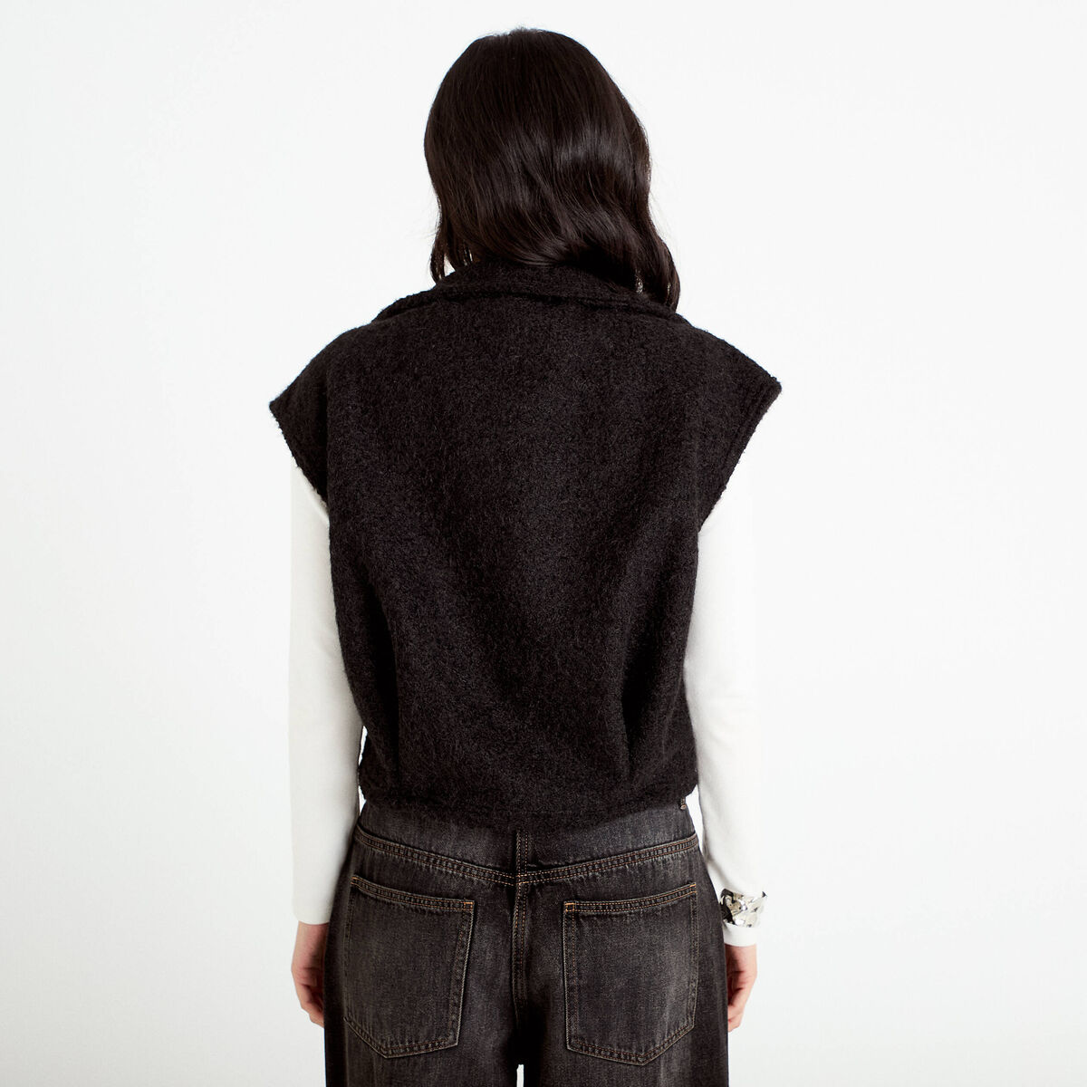 Veste bouclette sans manches col montant noir femme