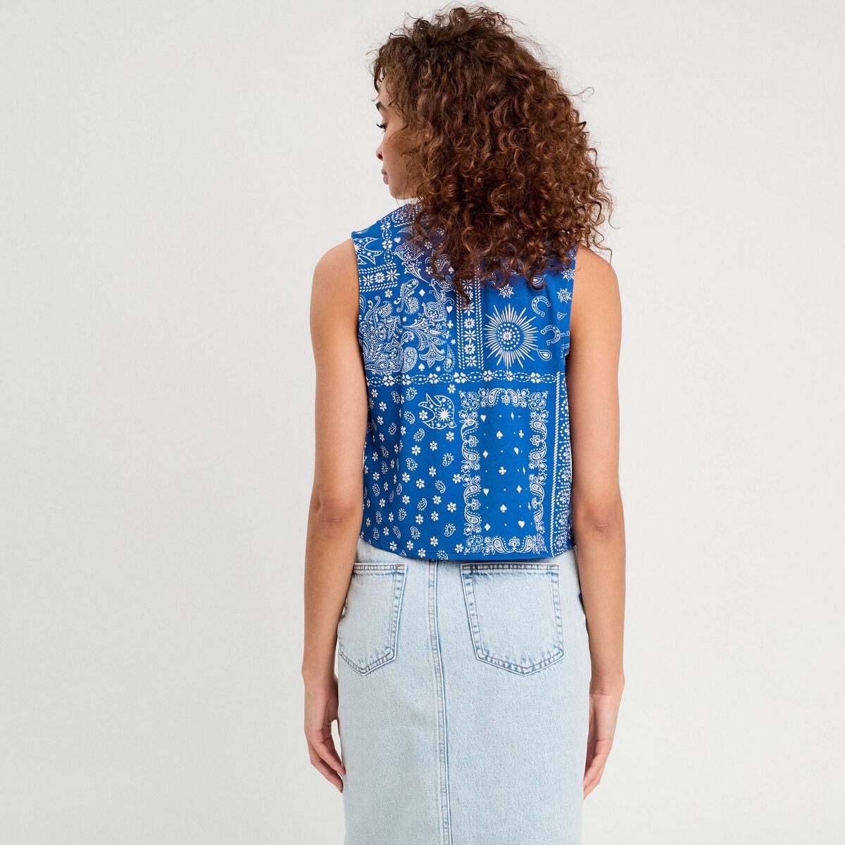 Blouse nou&eacute;e sans manches bleu femme