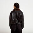 Veste droite similicuir col tailleur noir femme