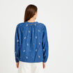 Blouse ample manches longues en jean blanc femme