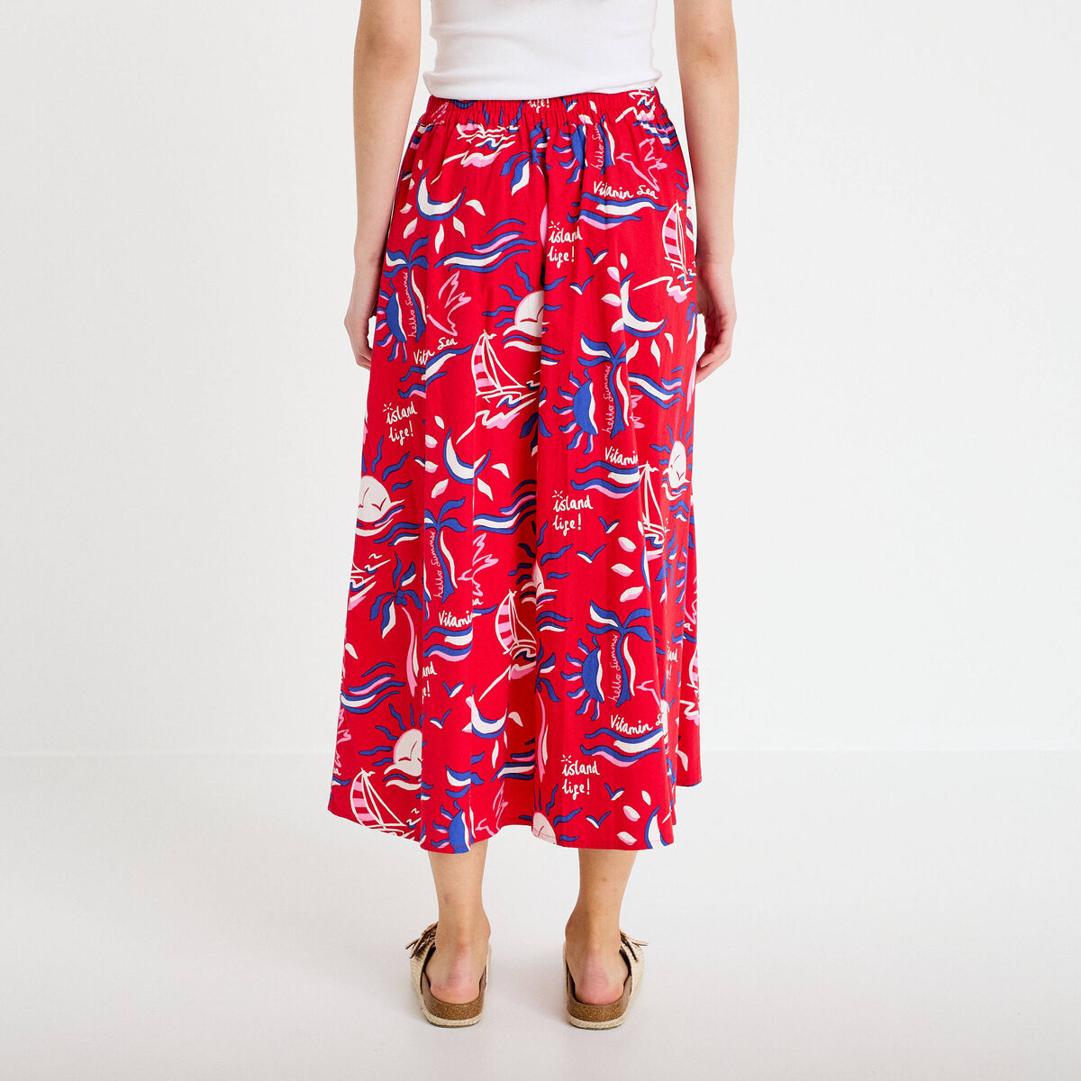 Jupon &eacute;vas&eacute; long rouge femme