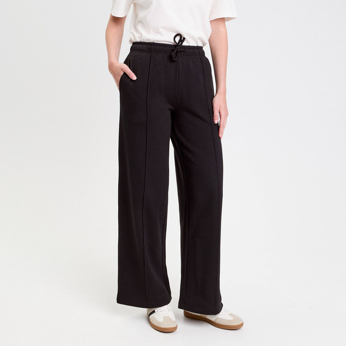 Pantalon large style jogging noir femme