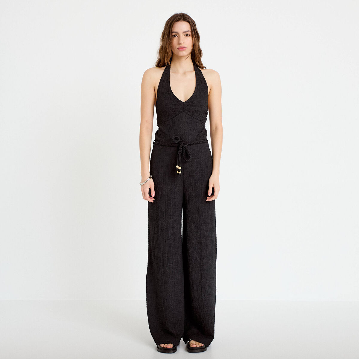 Combinaison large sans manches col v noir femme
