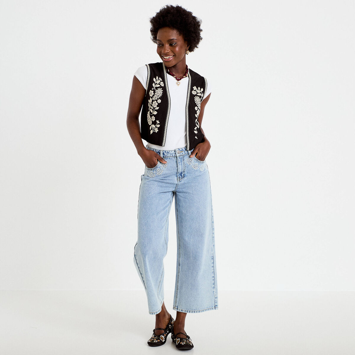 Gilet droit court sans manches noir femme