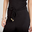 Combinaison large sans manches col v noir femme