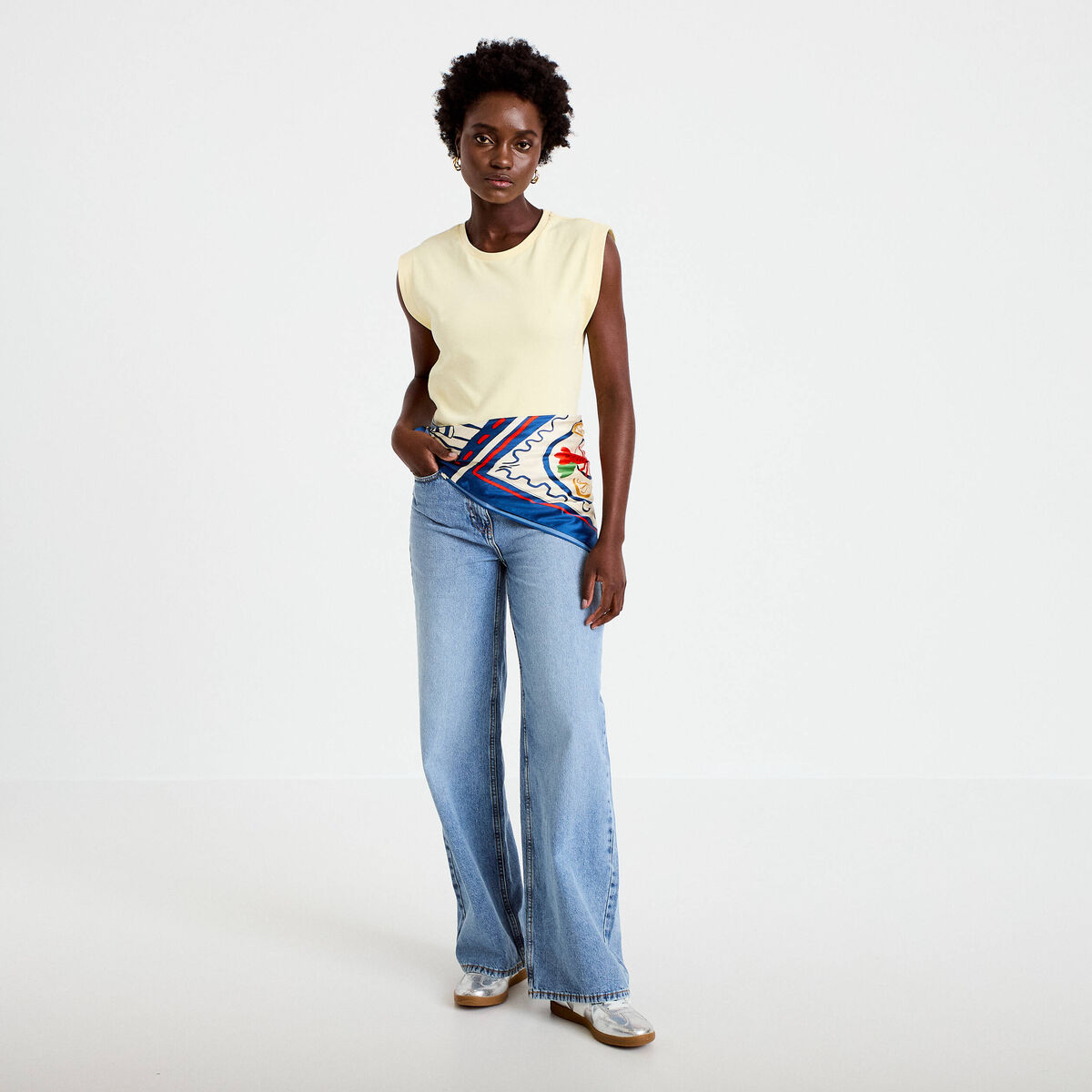 T-shirt col rond sans manches jaune pastel femme