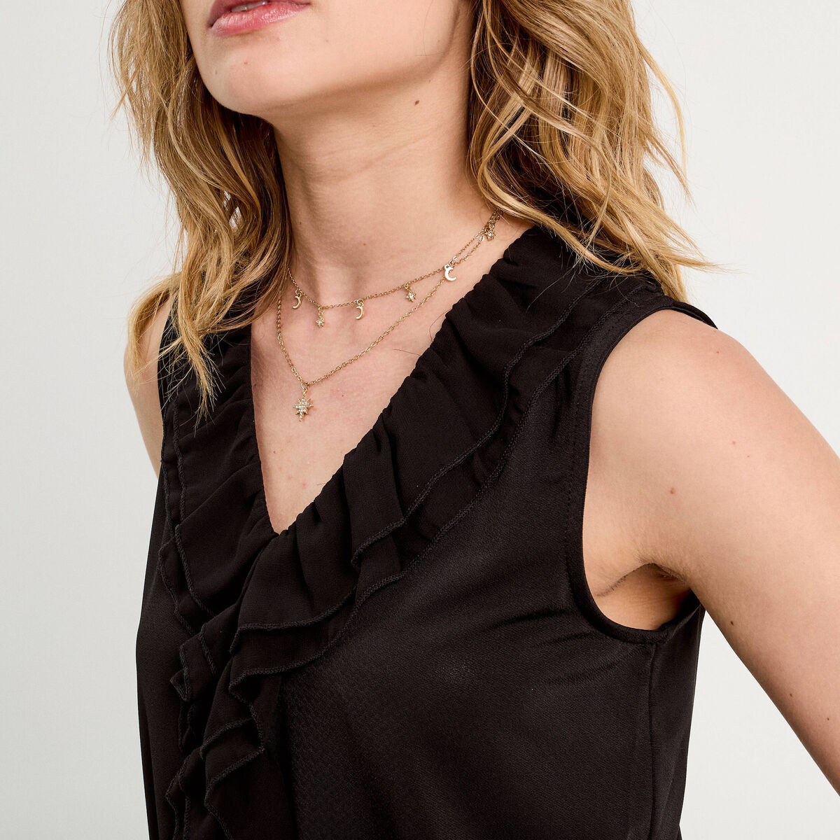 Blouse volants sans manches noir femme