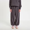 Jogging &agrave; d&eacute;tails clout&eacute;s taille basse gris fonc&eacute; femme