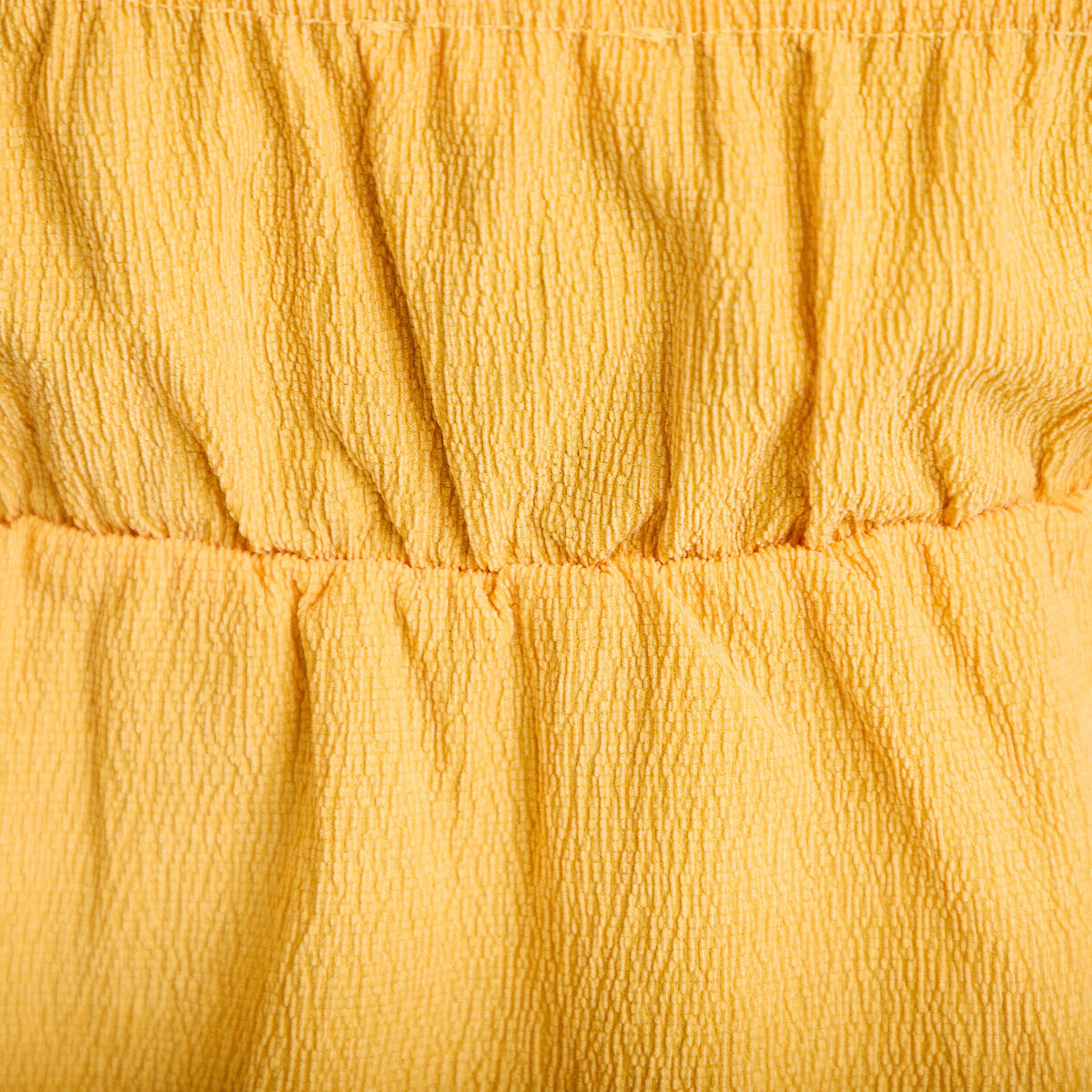 D&eacute;bardeur d&eacute;tail bijou orange clair femme