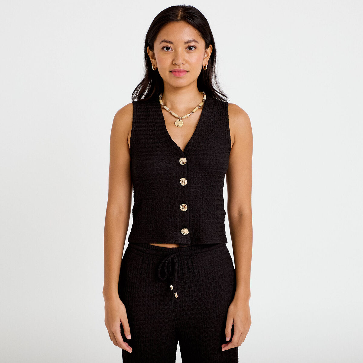 Gilet cintr&eacute; sans manches col v noir femme