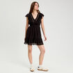 Robe &eacute;vas&eacute;e plumetis noir femme