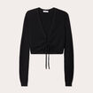 Pull cropped avec noeud noir femme