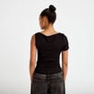 Top one shoulder pliss&eacute; manches courtes noir femme