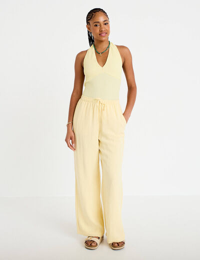 Top cintr&eacute; sans manches avec relief jaune pastel femme