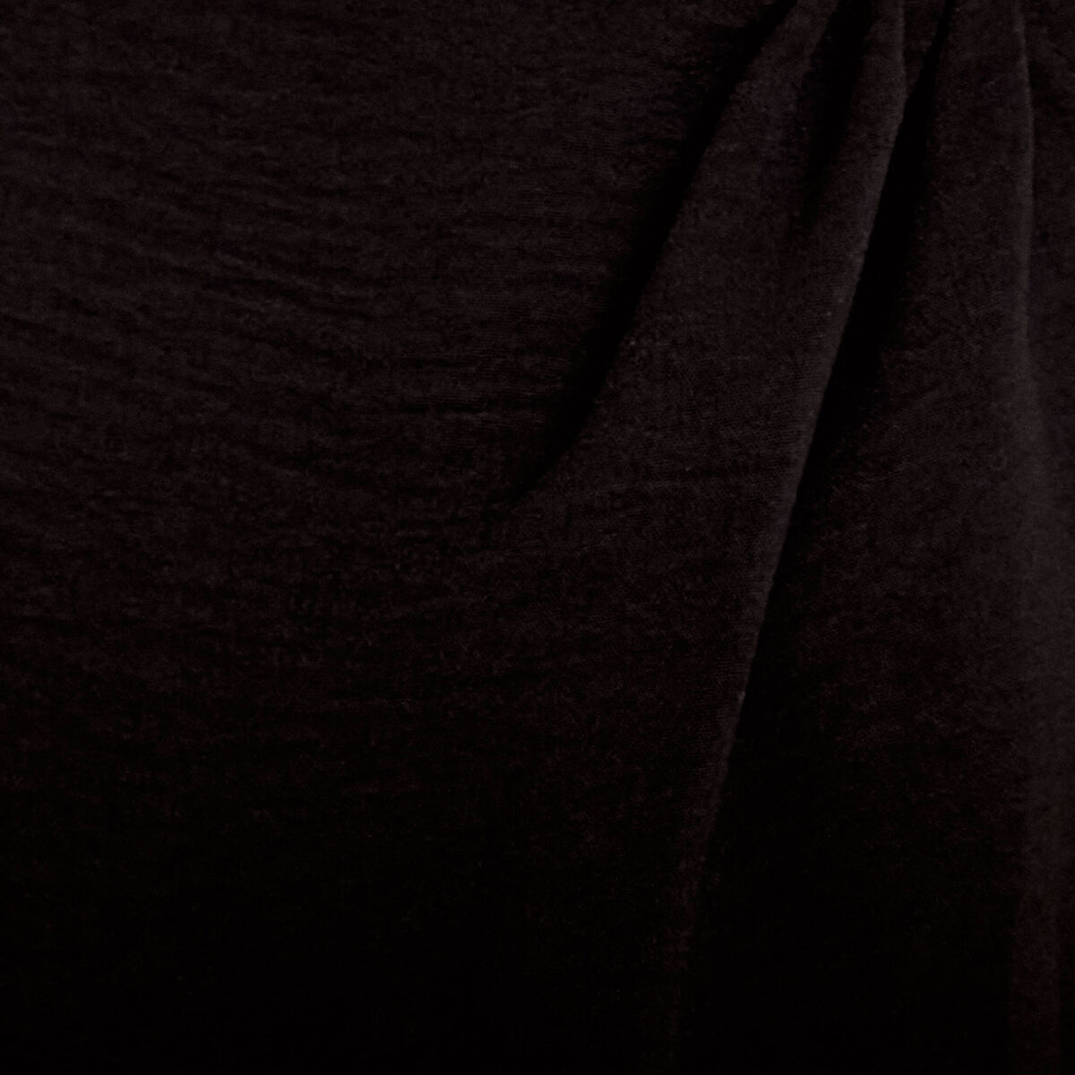 Combinaison large sans manches col rond noir femme