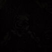 Pull fleurs en relief noir femme