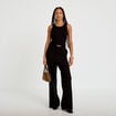 Combinaison large sans manches ceintur&eacute;e noir femme
