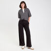 Pantalon large style jogging noir femme