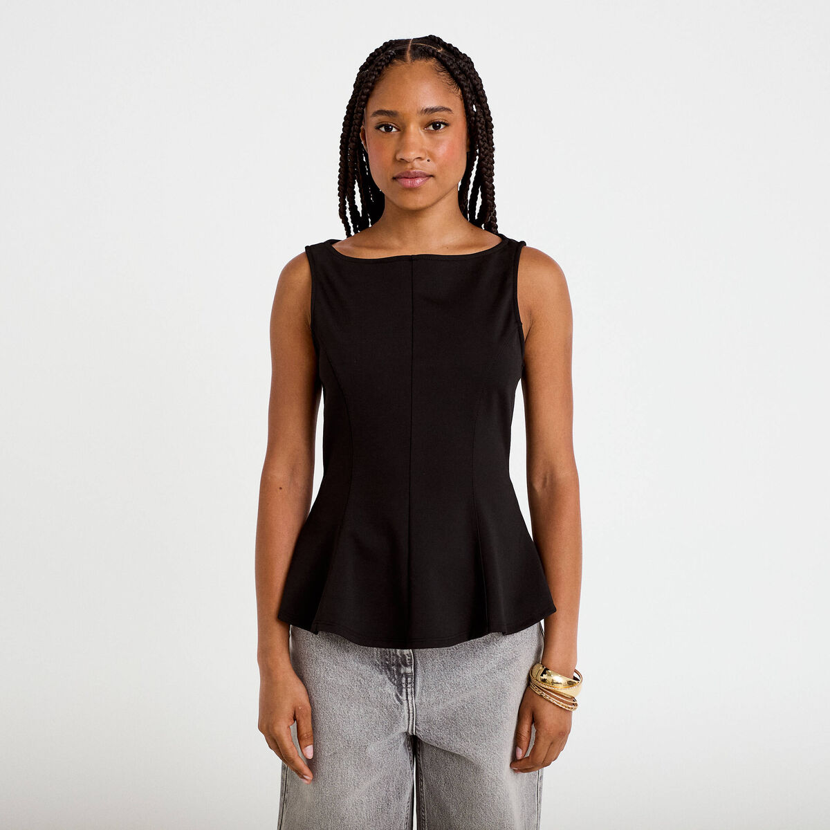 Top p&eacute;plum sans manches col rond noir femme