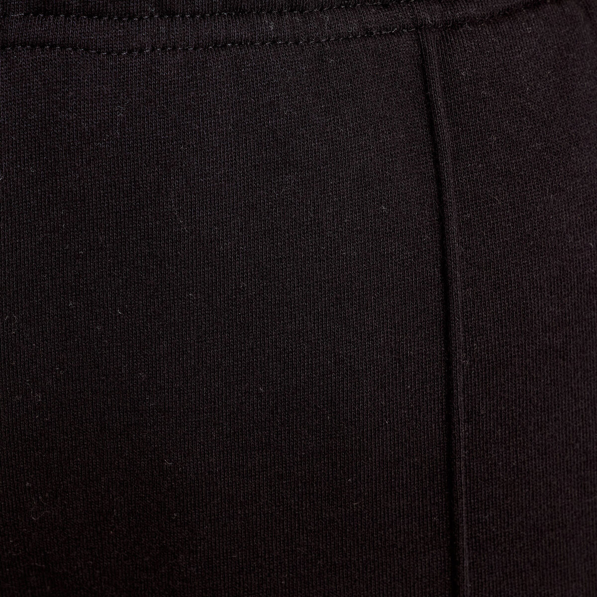 Pantalon large style jogging noir femme