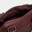 Sac port&eacute; main bordeaux femme