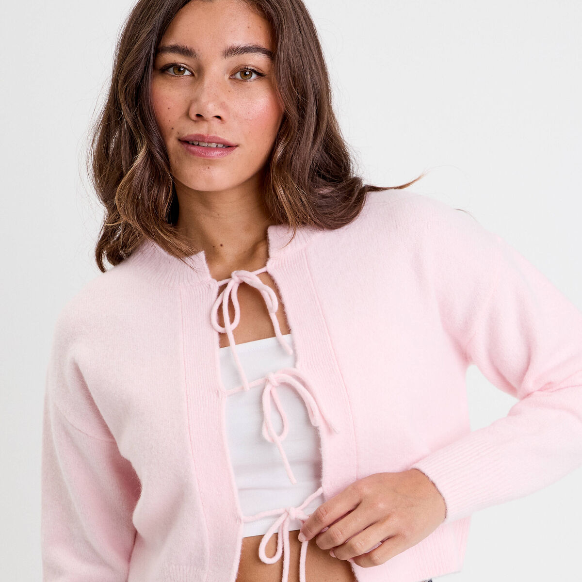 Gilet court nou&eacute; rose clair femme