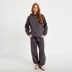 Jogging &agrave; d&eacute;tails clout&eacute;s taille basse gris fonc&eacute; femme