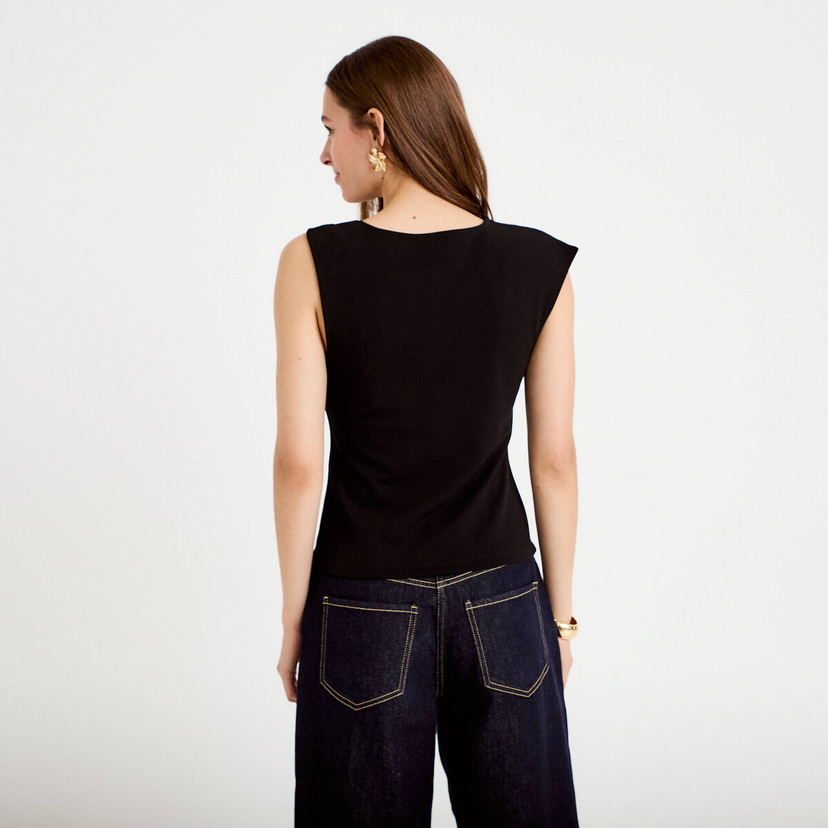 Top asym&eacute;trique d&eacute;tail bijou noir femme