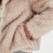 Veste courte en fausse fourrure sable femme