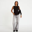 Top p&eacute;plum sans manches col rond noir femme
