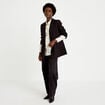 Blazer oversize brillant manches longues noir femme
