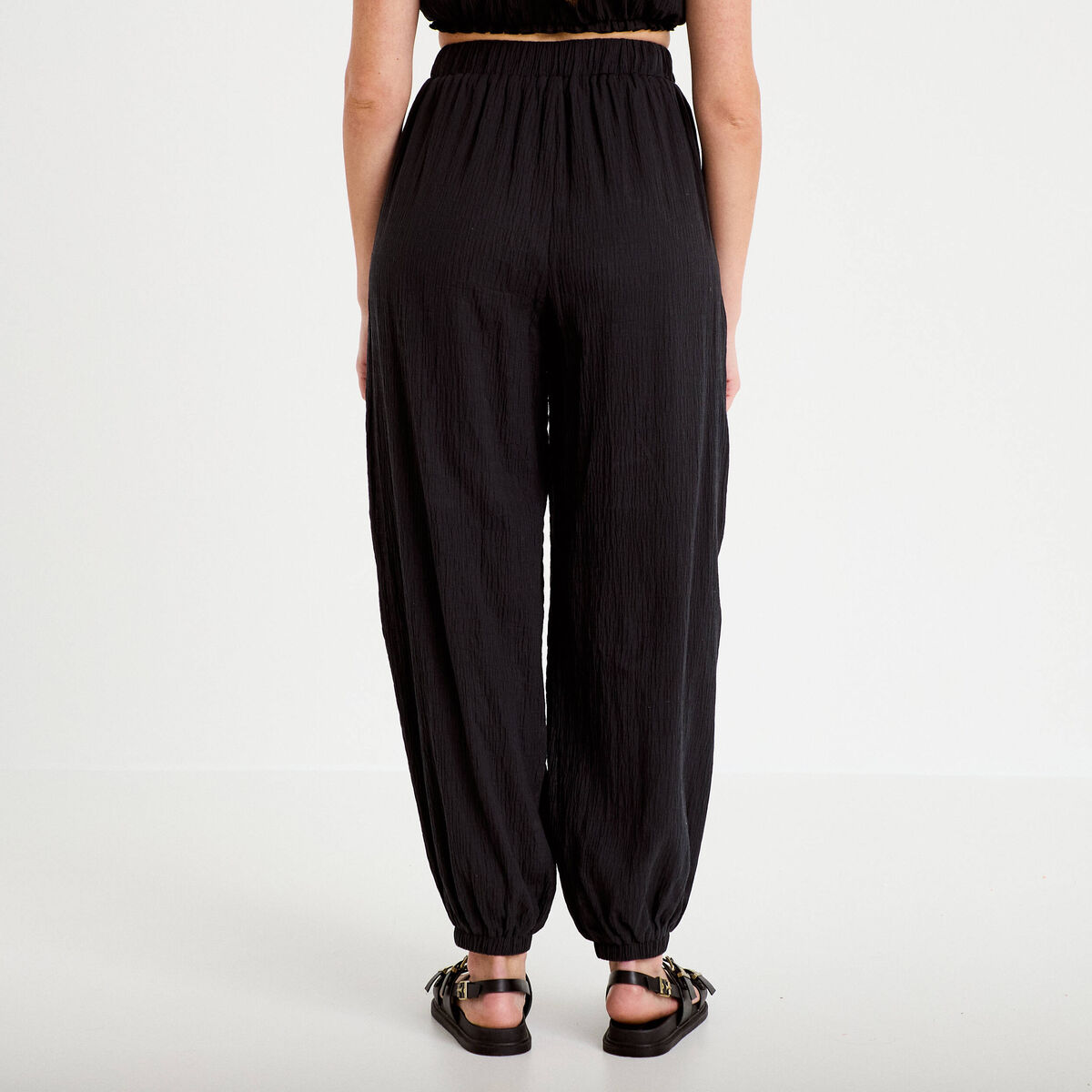 Pantalon large taille haute pliss&eacute; noir femme
