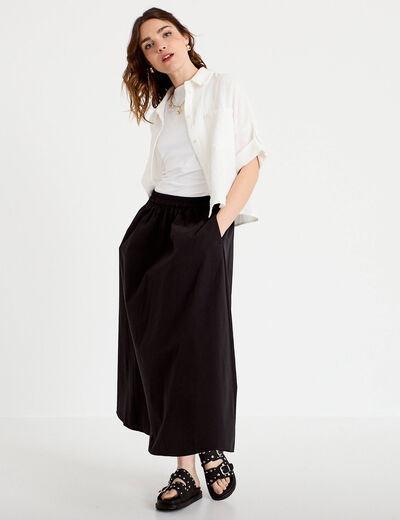 Jupon &eacute;vas&eacute; long noir femme