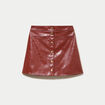 Jupe trap&egrave;ze courte en similicuir marron cognac femme