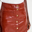Jupe trap&egrave;ze courte en similicuir marron cognac femme