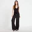 Combinaison large sans manches col v noir femme